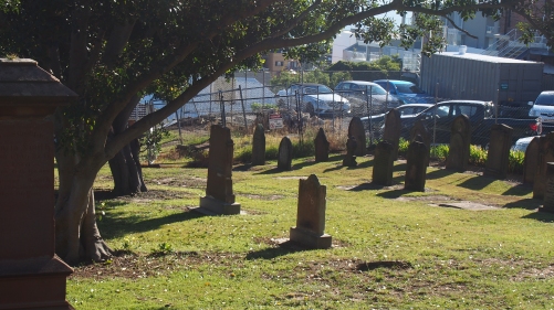 All that remains of the graveyard today - some headstones are so worn they are no longer legible.
